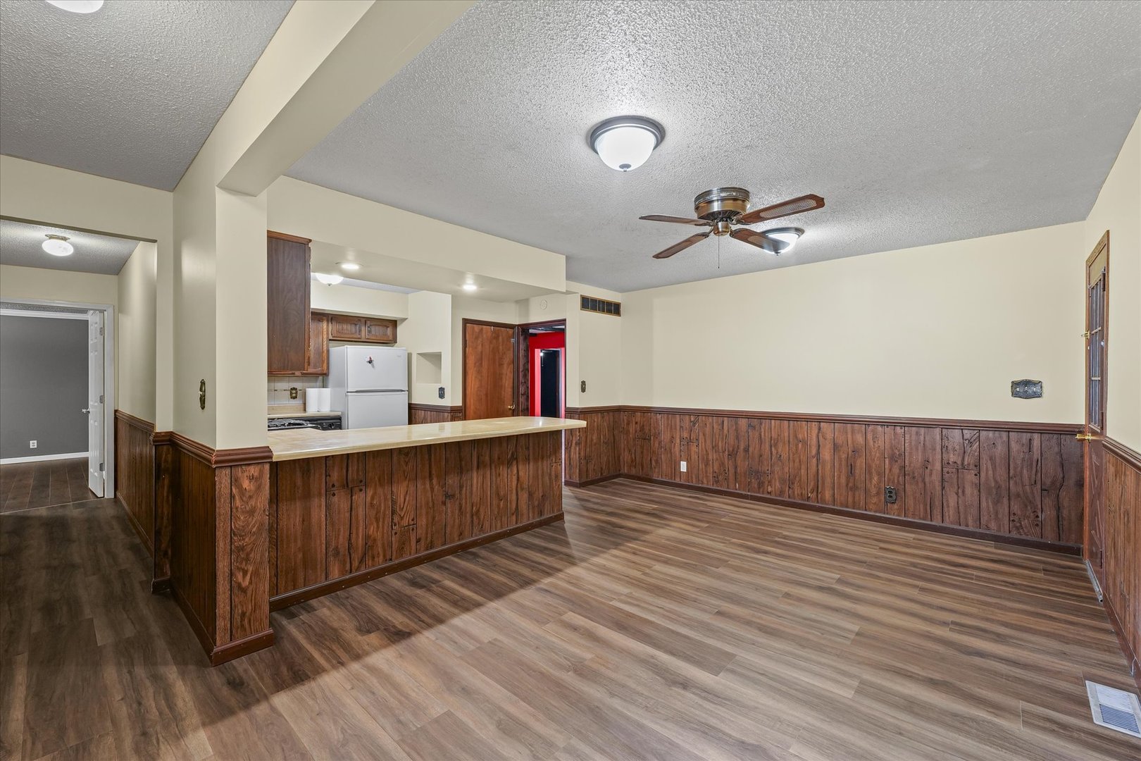 309 North Watson Street Tolono, IL 61880 - Photo 10 of 33 a view of kitchen with furniture and wooden floor