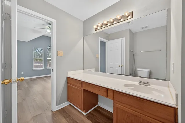 a bathroom with a sink double vanity and a mirror