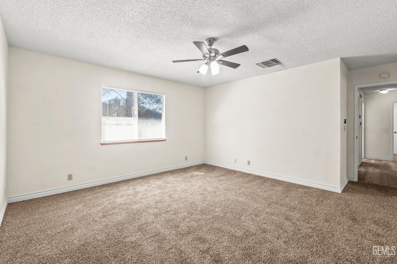 Undisclosed Address Ridgecrest, CA 93555 - Photo 16 of 28 a view of an empty room with a window