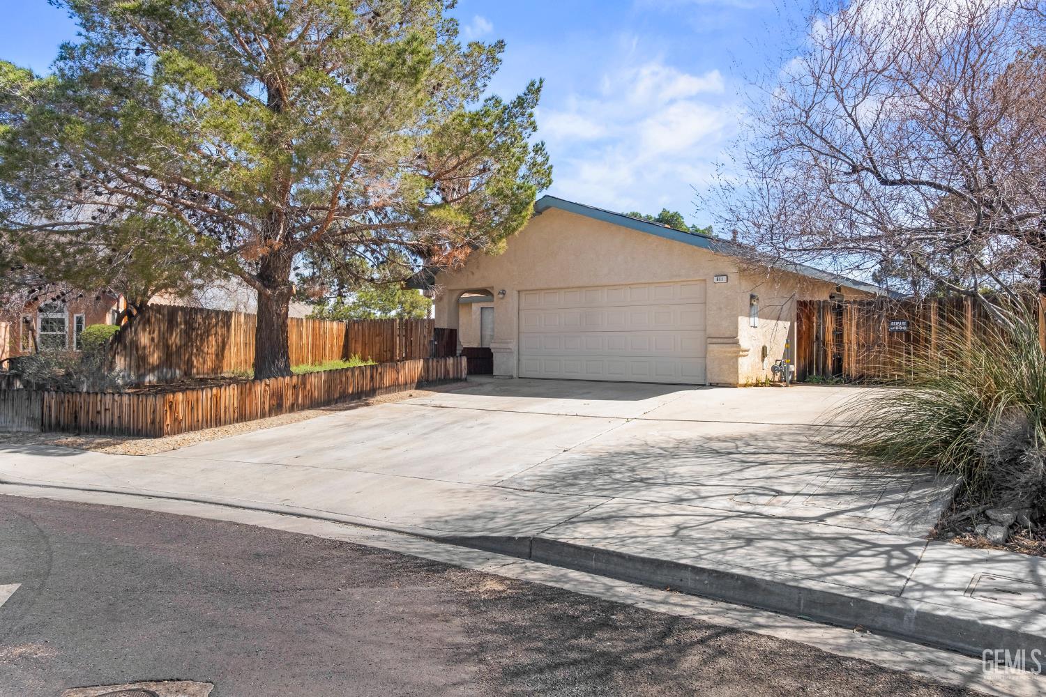 Undisclosed Address Ridgecrest, CA 93555 - Photo 3 of 28 a house with trees in front of it