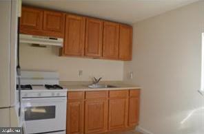 175 Haddon Avenue, Unit D West Berlin, NJ 08091 - Photo 5 of 6 a kitchen with a sink cabinets and appliances