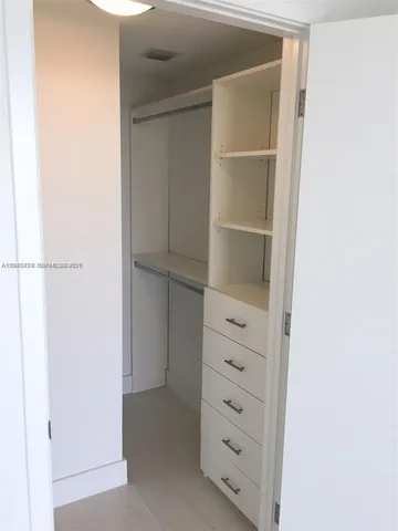 a bathroom with a toilet a sink and bathtub