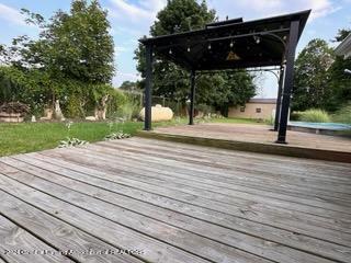 15695 South Wacousta Road Grand Ledge, MI 48837 - Photo 22 of 31 Back Deck
