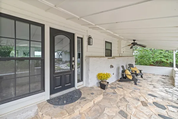 a view of a swimming pool with a lounge chairs