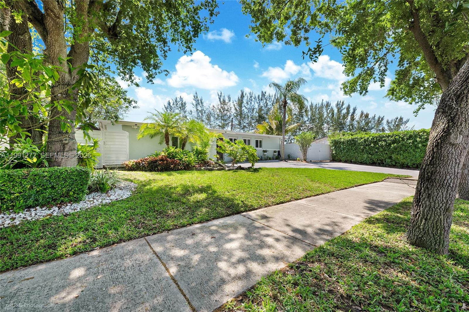 8535 Southwest 97th Road Miami, FL 33173 - Photo 1 of 28 a view of a park with large trees