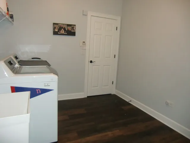 a utility room with washer and dryer
