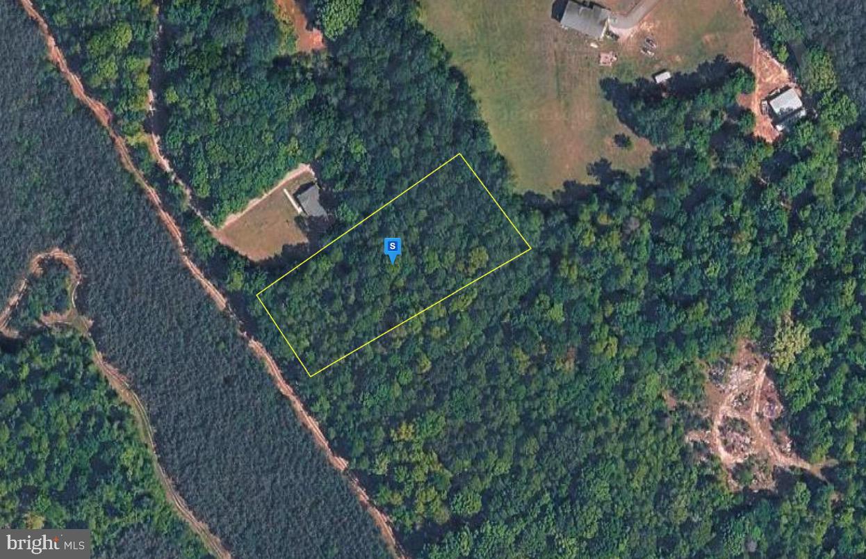 a balcony with wooden floor and lake view