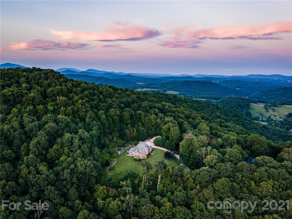 127 Alan Drive Boone, NC 28607 - Photo 12 of 37 a view of a city and green field