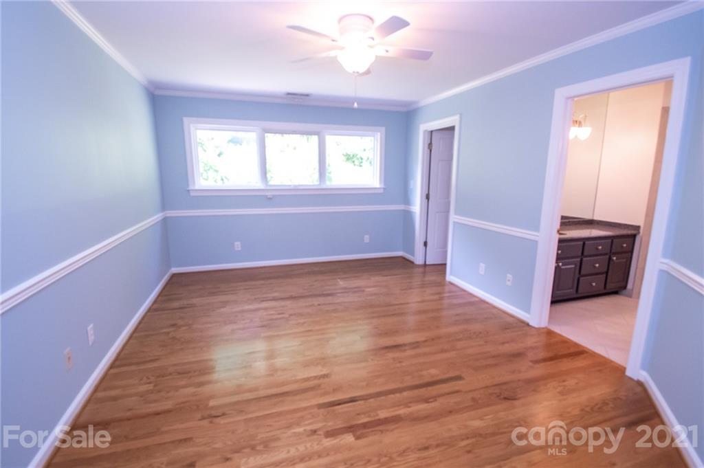 127 Alan Drive Boone, NC 28607 - Photo 27 of 37 wooden floor in an empty room with a window