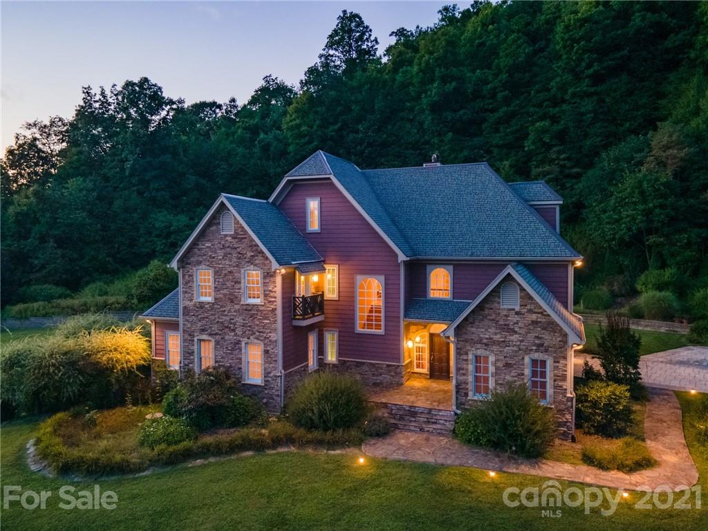 127 Alan Drive Boone, NC 28607 - Photo 4 of 37 a front view of a house with a yard