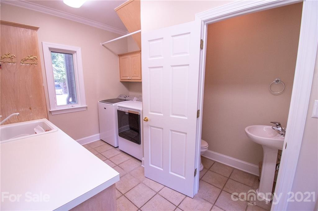 127 Alan Drive Boone, NC 28607 - Photo 37 of 37 a bathroom with a sink and a toilet