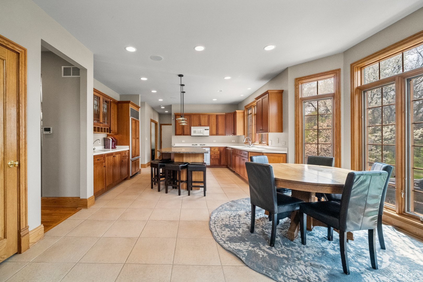 13N227 Coombs Road Elgin, IL 60124 - Photo 14 of 43 a view of a dining area with furniture window and outside view