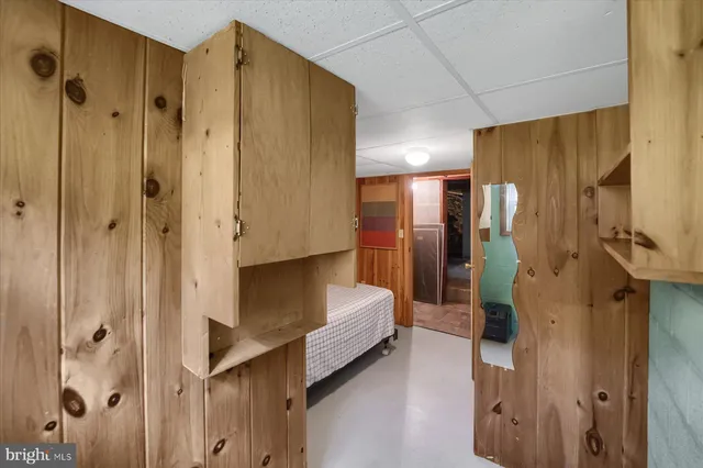 a bathroom with a double vanity sink and shower