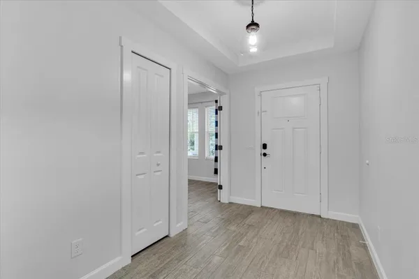 a view of a bedroom with a furniture and empty racks