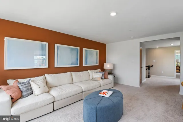 a living room with furniture and a couch