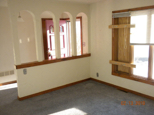 13949 Center Road Durand, IL 61024 - Photo 2 of 5 an empty room with windows
