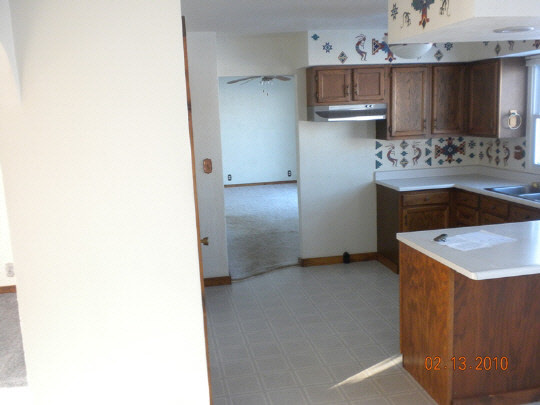 13949 Center Road Durand, IL 61024 - Photo 4 of 5 a kitchen with cabinets and oven