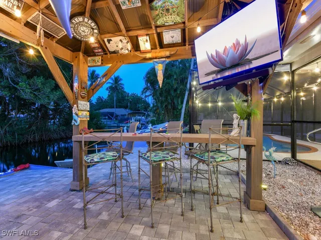 a view of a chairs and tables in patio