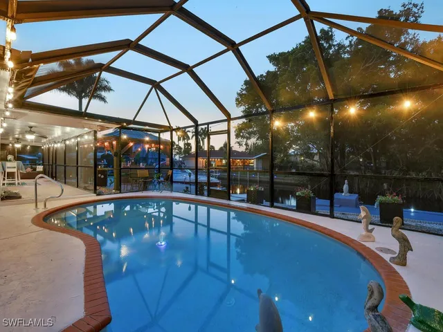 a view of a swimming pool with a patio