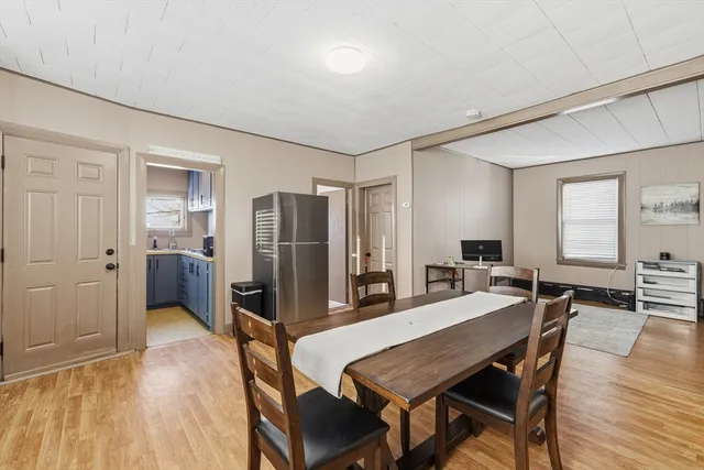 a view of a workspace with furniture