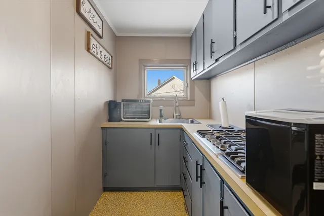 a bathroom with a bathtub a toilet and a shower