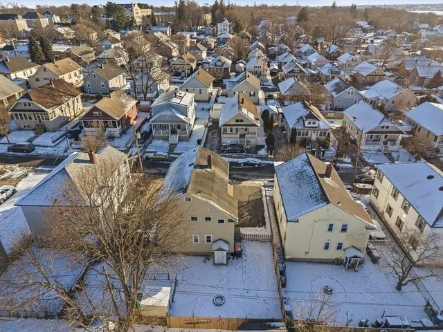 an aerial view of a city with lots of residential buildings