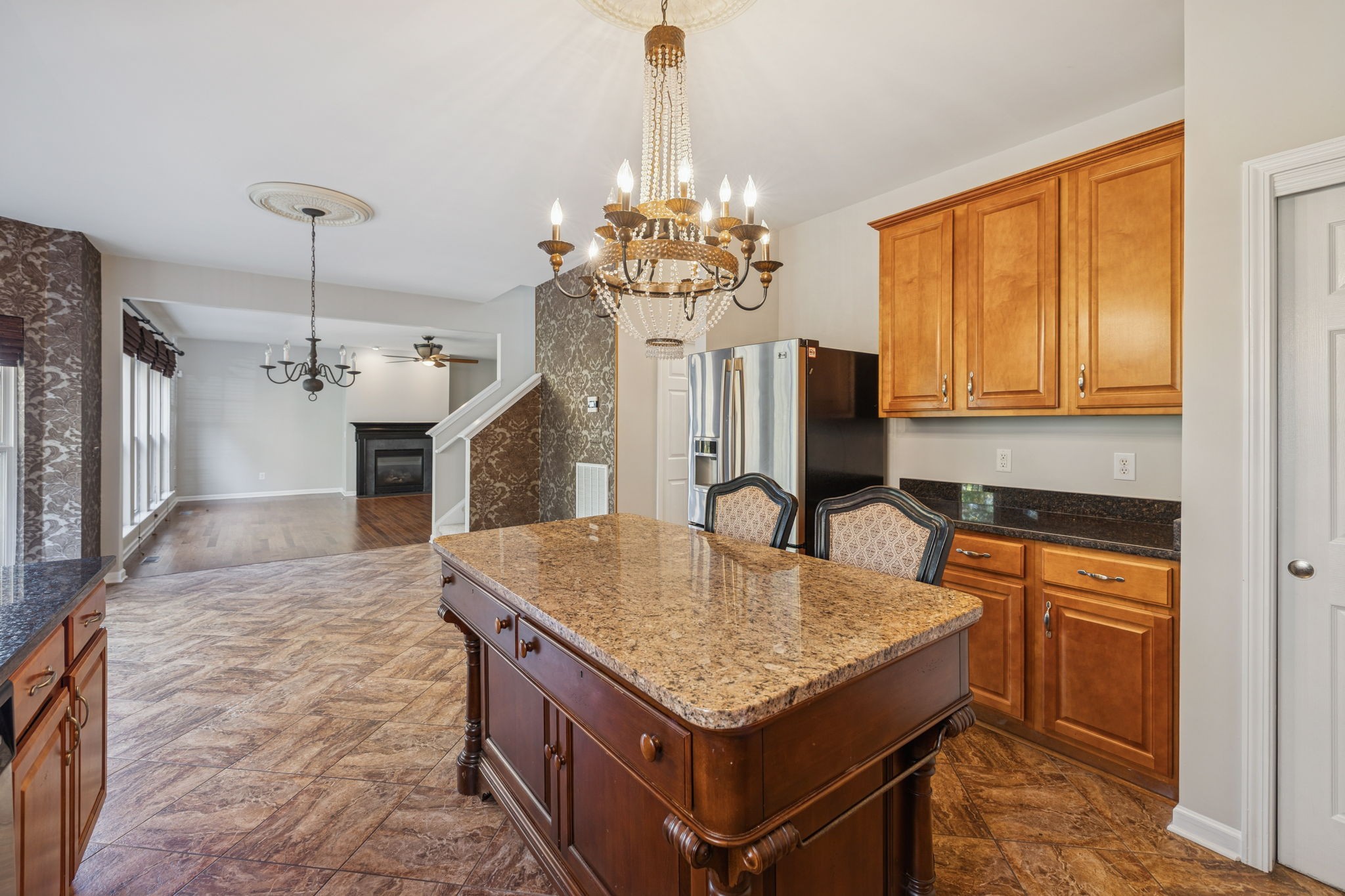 322 Forest Bend Drive Mount Juliet, TN 37122 - Photo 22 of 62 a kitchen with kitchen island granite countertop a stove oven and a sink