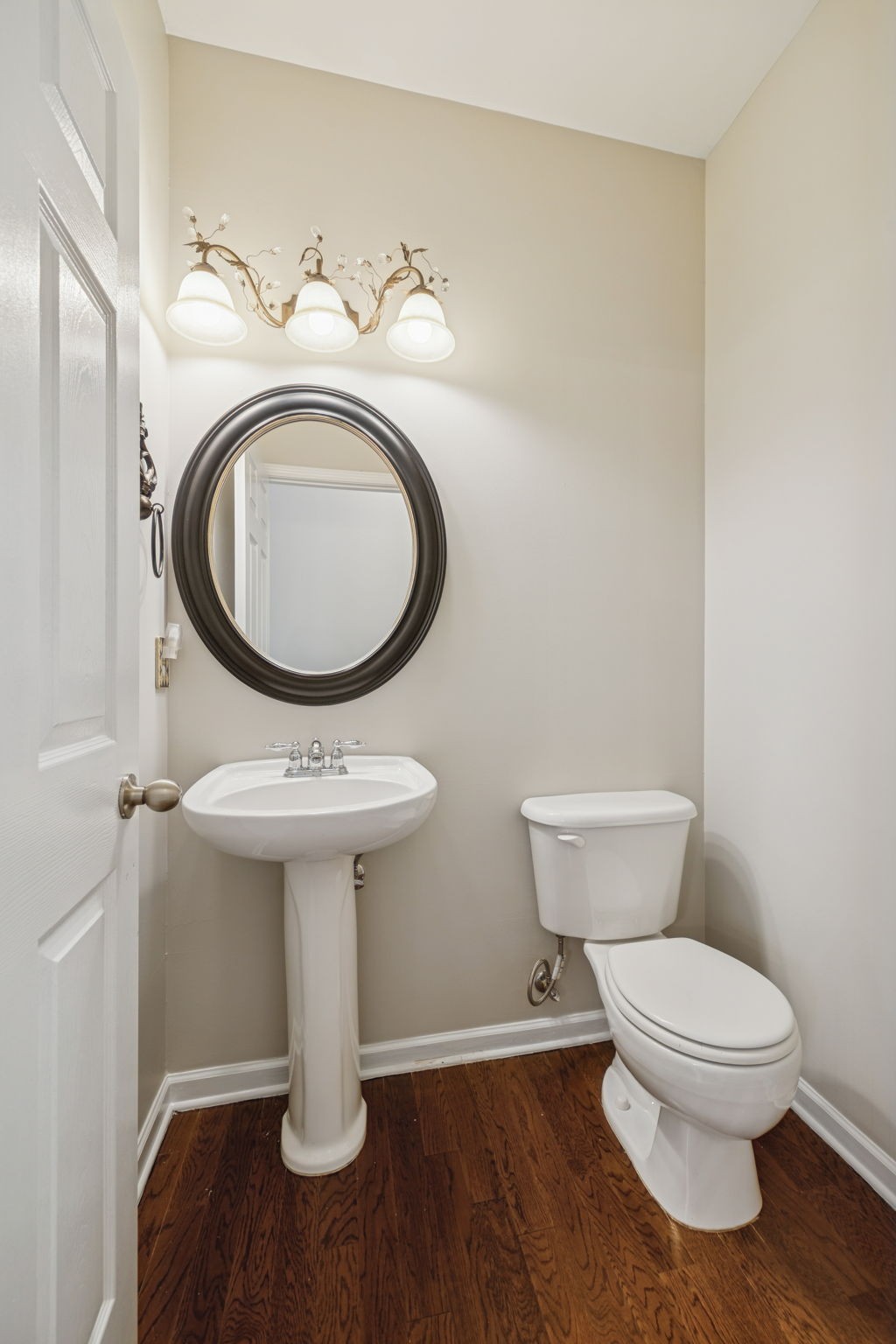 322 Forest Bend Drive Mount Juliet, TN 37122 - Photo 24 of 62 a bathroom with a toilet sink and mirror