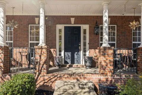 a front view of a house with street