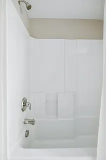 an aerial view of a house with a swimming pool yard and outdoor seating