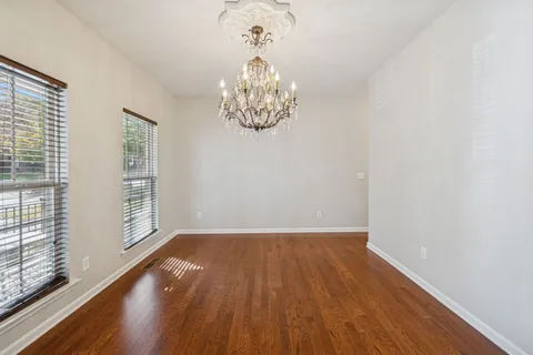 a view of a livingroom with wooden floor