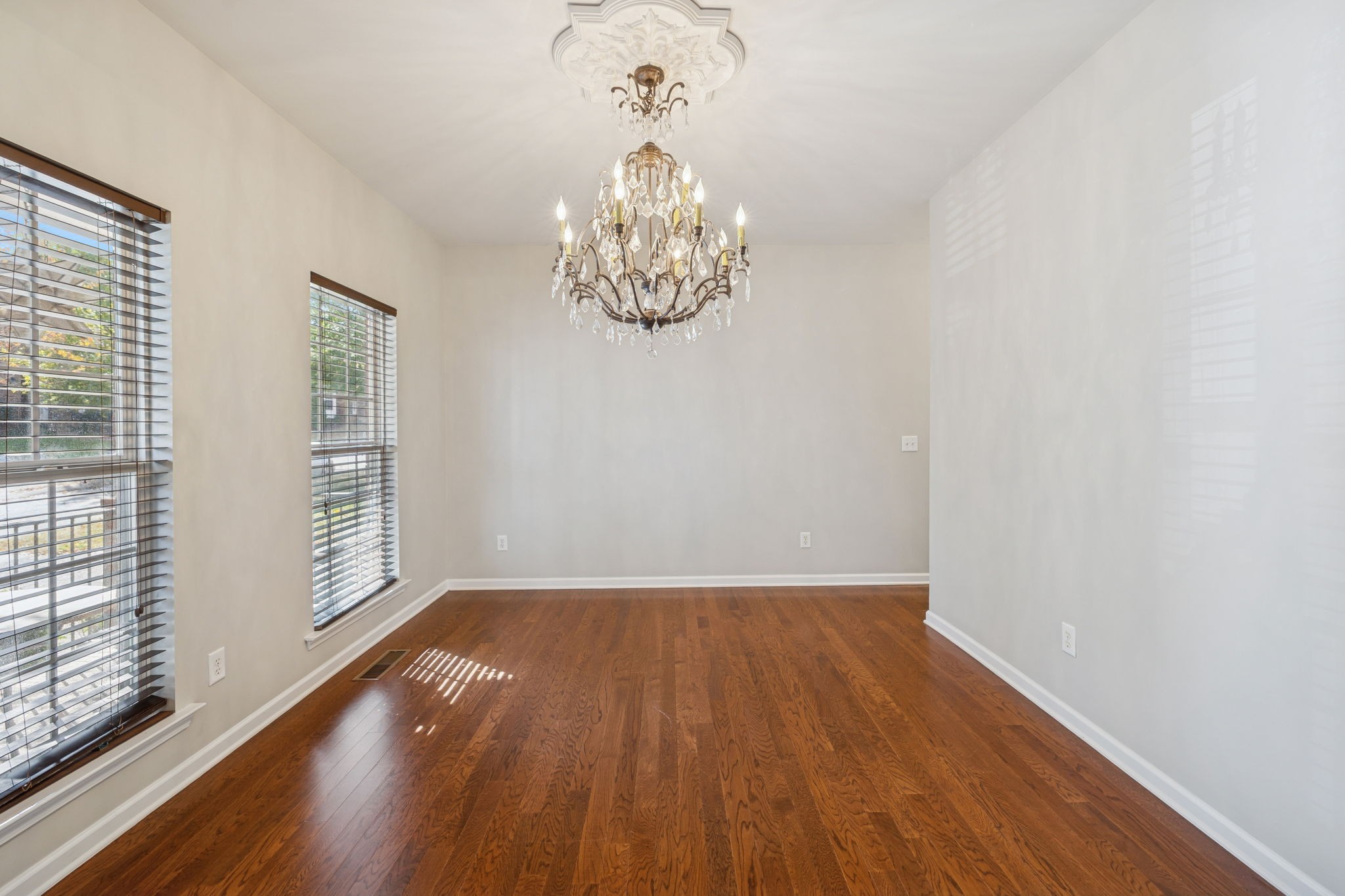 322 Forest Bend Drive Mount Juliet, TN 37122 - Photo 8 of 62 a view of empty room with wooden floor and fan