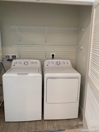 a utility room with dryer and washer