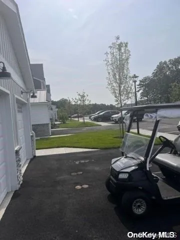 a view of a swimming pool with a yard