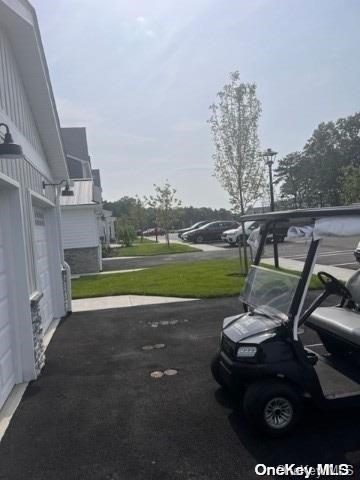 201 Jerusalem Hollow Road Manorville, NY 11949 - Photo 13 of 15 a view of a swimming pool with a yard