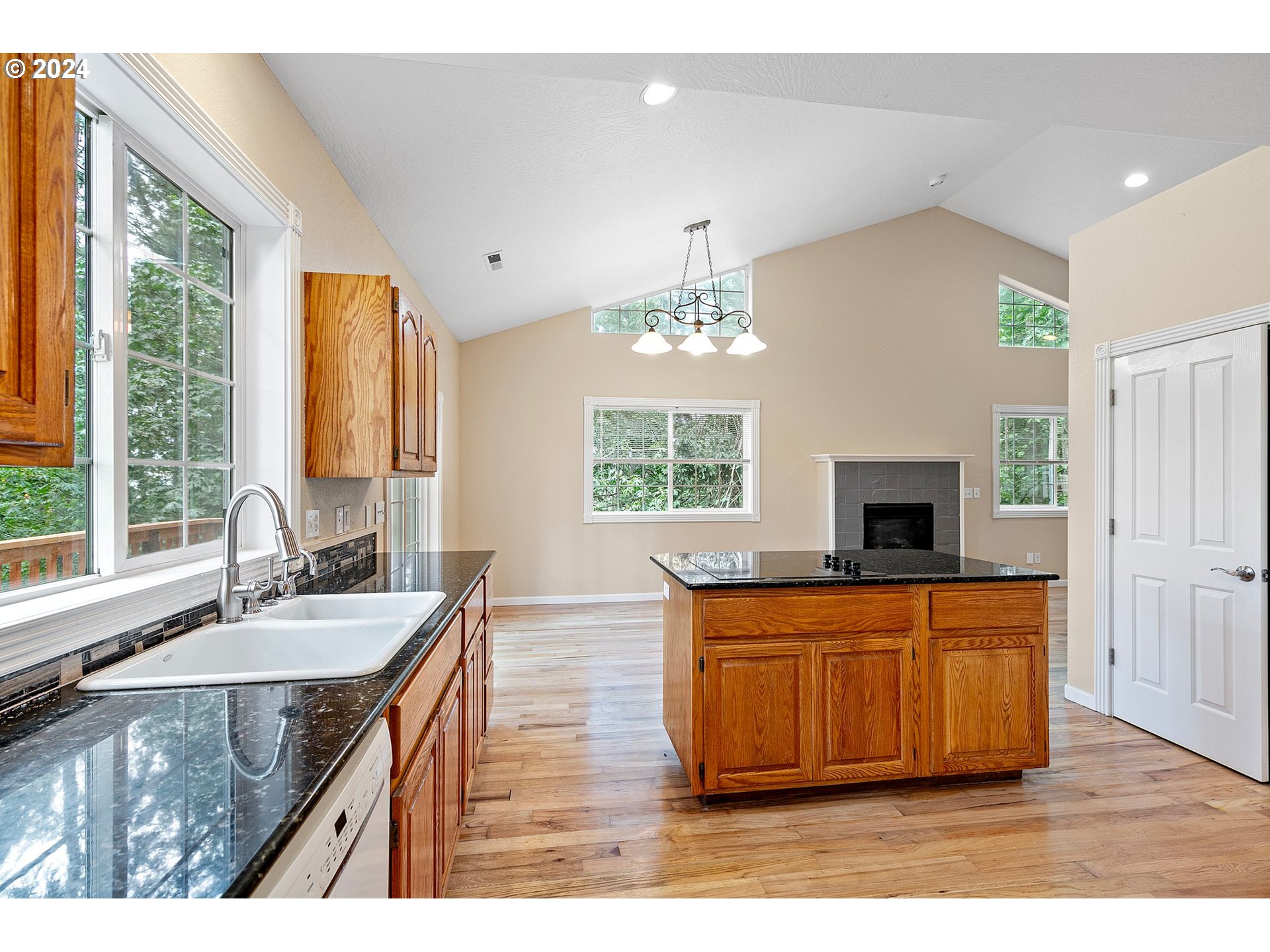 626 South 73rd Street Springfield, OR 97478 - Photo 14 of 46 a kitchen with a sink appliances and a large window