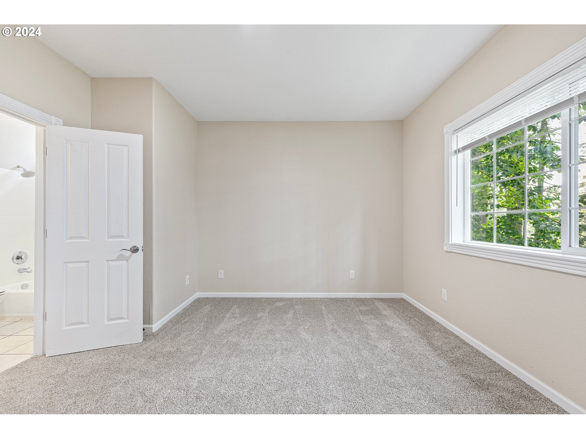 626 South 73rd Street Springfield, OR 97478 - Photo 18 of 46 a view of an empty room with a window