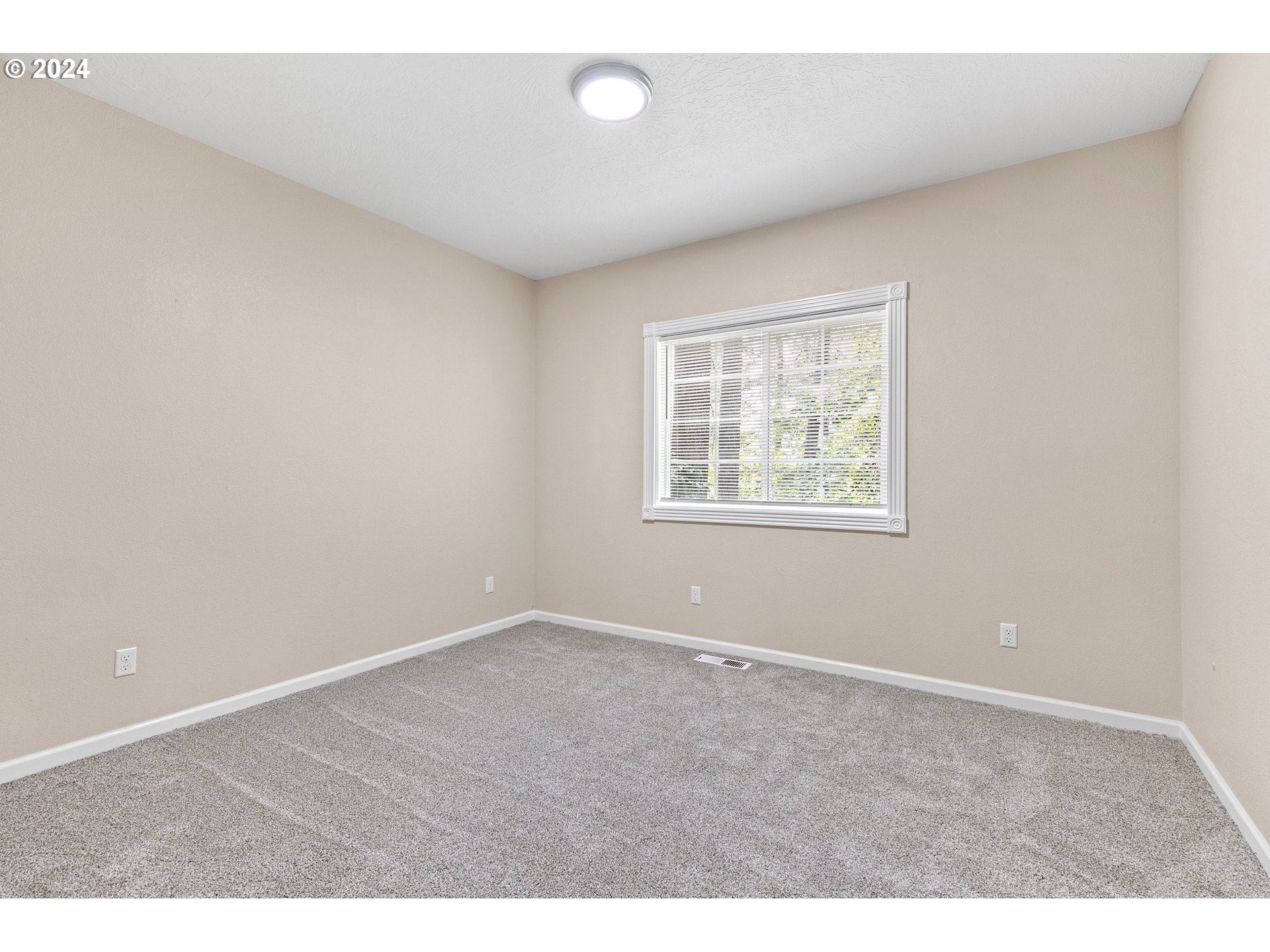 626 South 73rd Street Springfield, OR 97478 - Photo 35 of 46 an empty room with windows