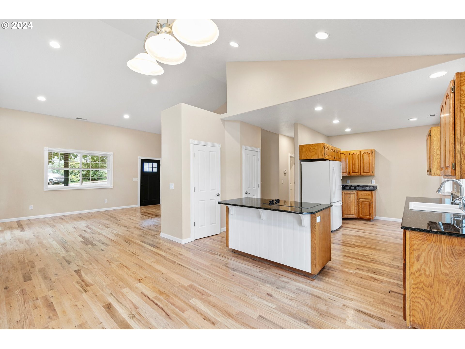 626 South 73rd Street Springfield, OR 97478 - Photo 9 of 46 a view of kitchen with cabinets and wooden floor