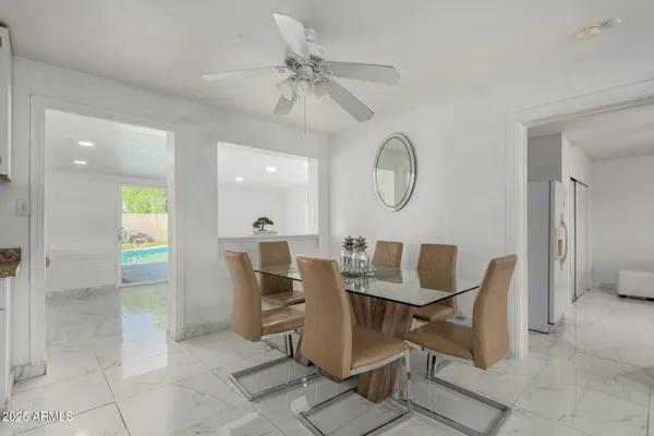 a view of a dining room with furniture