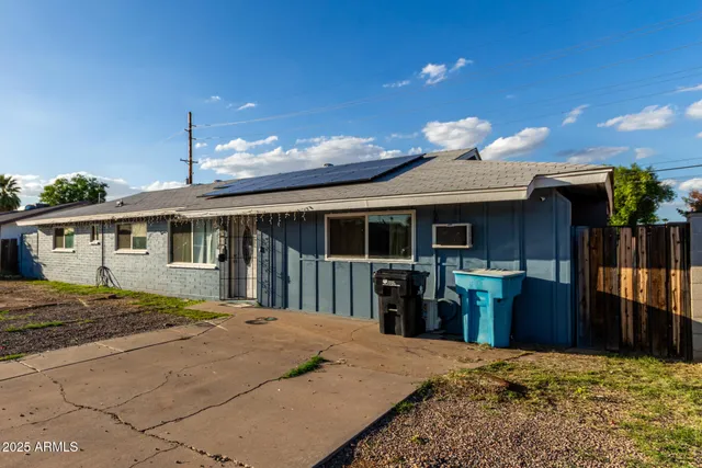 a front view of a house with a porch