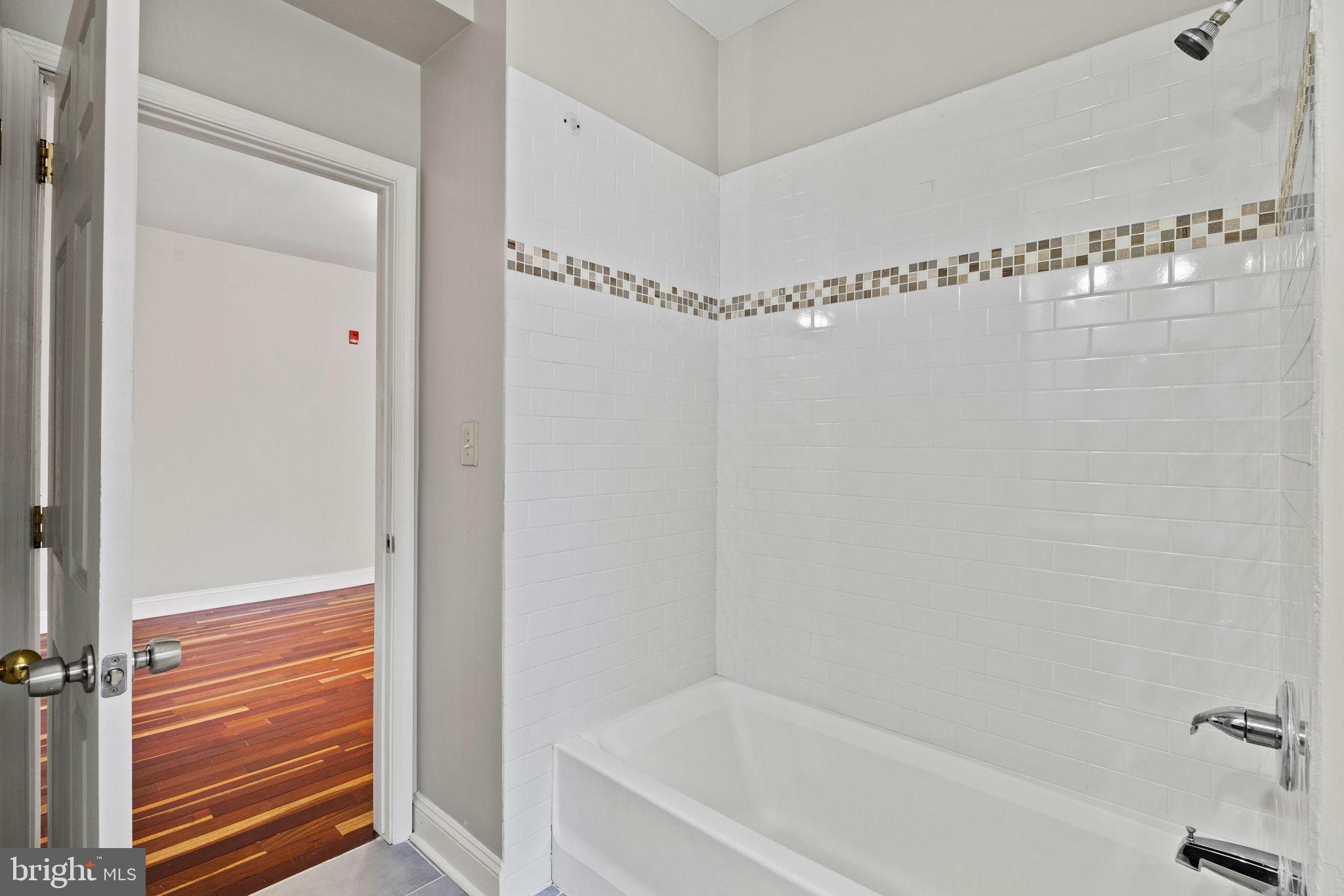 426 South 44th Street, Unit 2 Philadelphia, PA 19104 - Photo 23 of 29 a bathroom with a bathtub