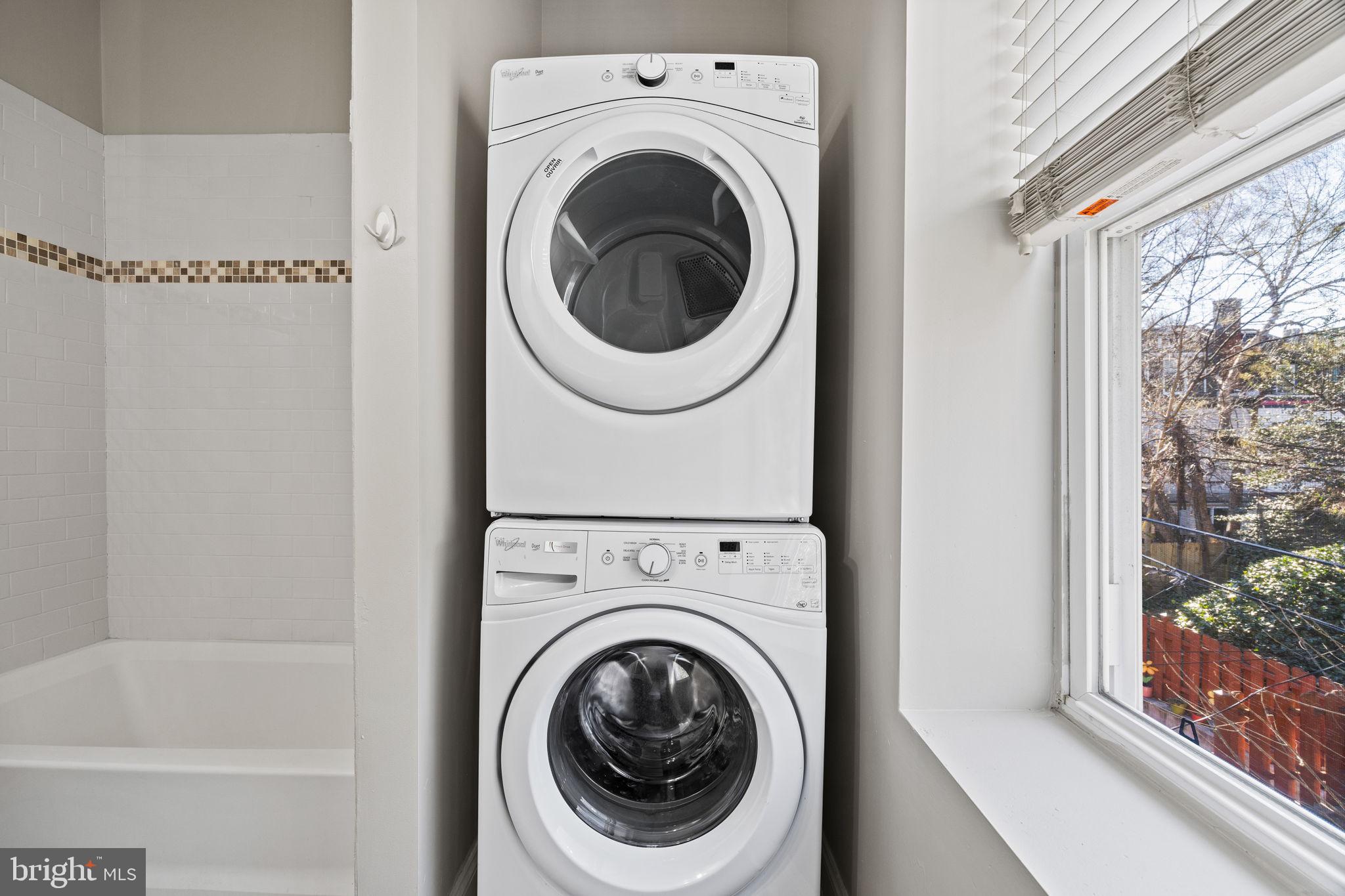 426 South 44th Street, Unit 2 Philadelphia, PA 19104 - Photo 26 of 29 a utility room with dryer and washer