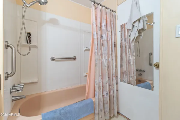 a view of a swimming pool with outdoor seating space