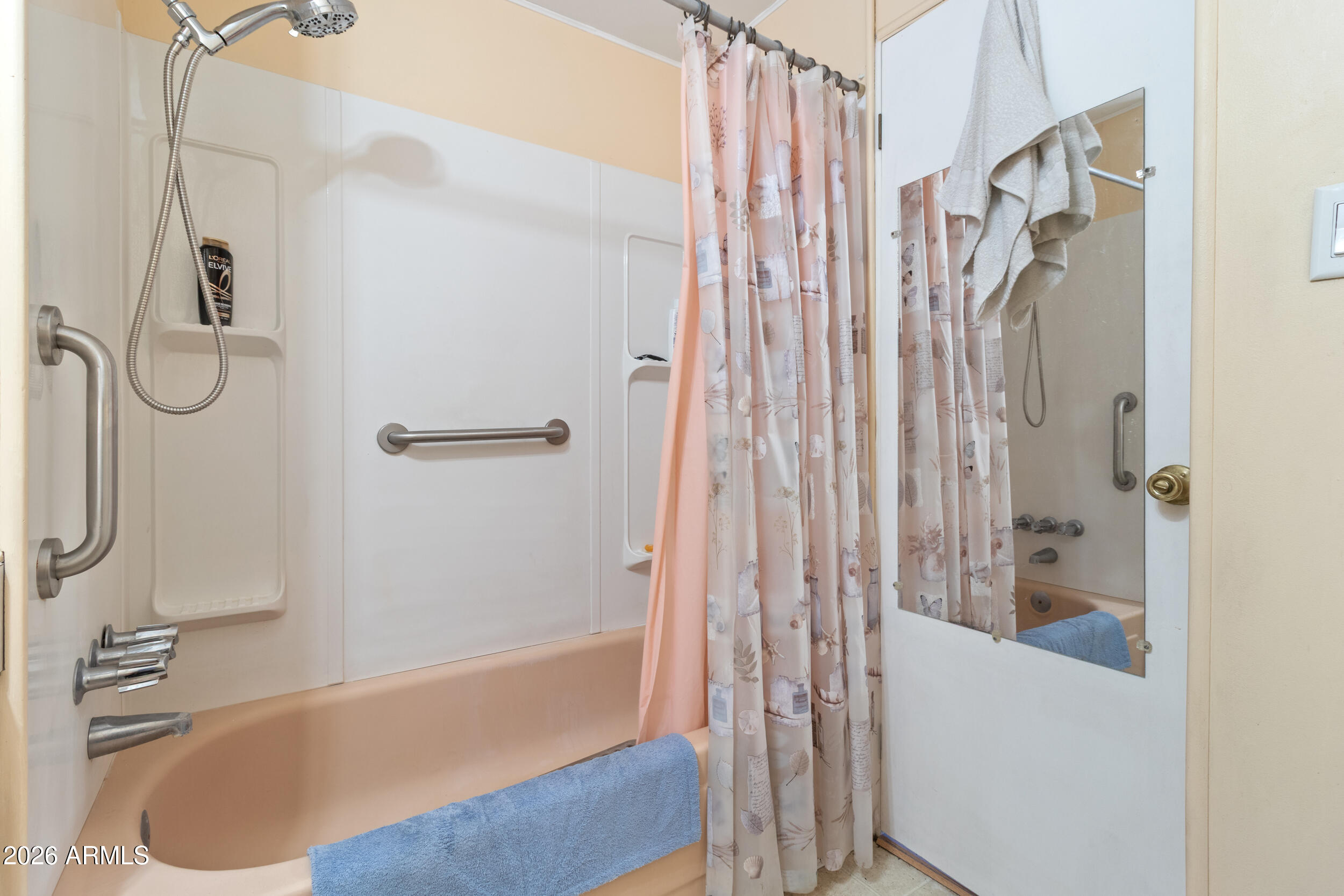 701 South Dobson Road, Unit 343 Mesa, AZ 85202 - Photo 16 of 70 a bathroom with a tub and a shower