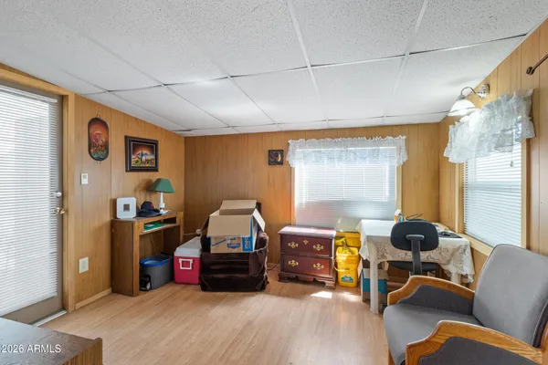 a view of a swimming pool with a table and chairs