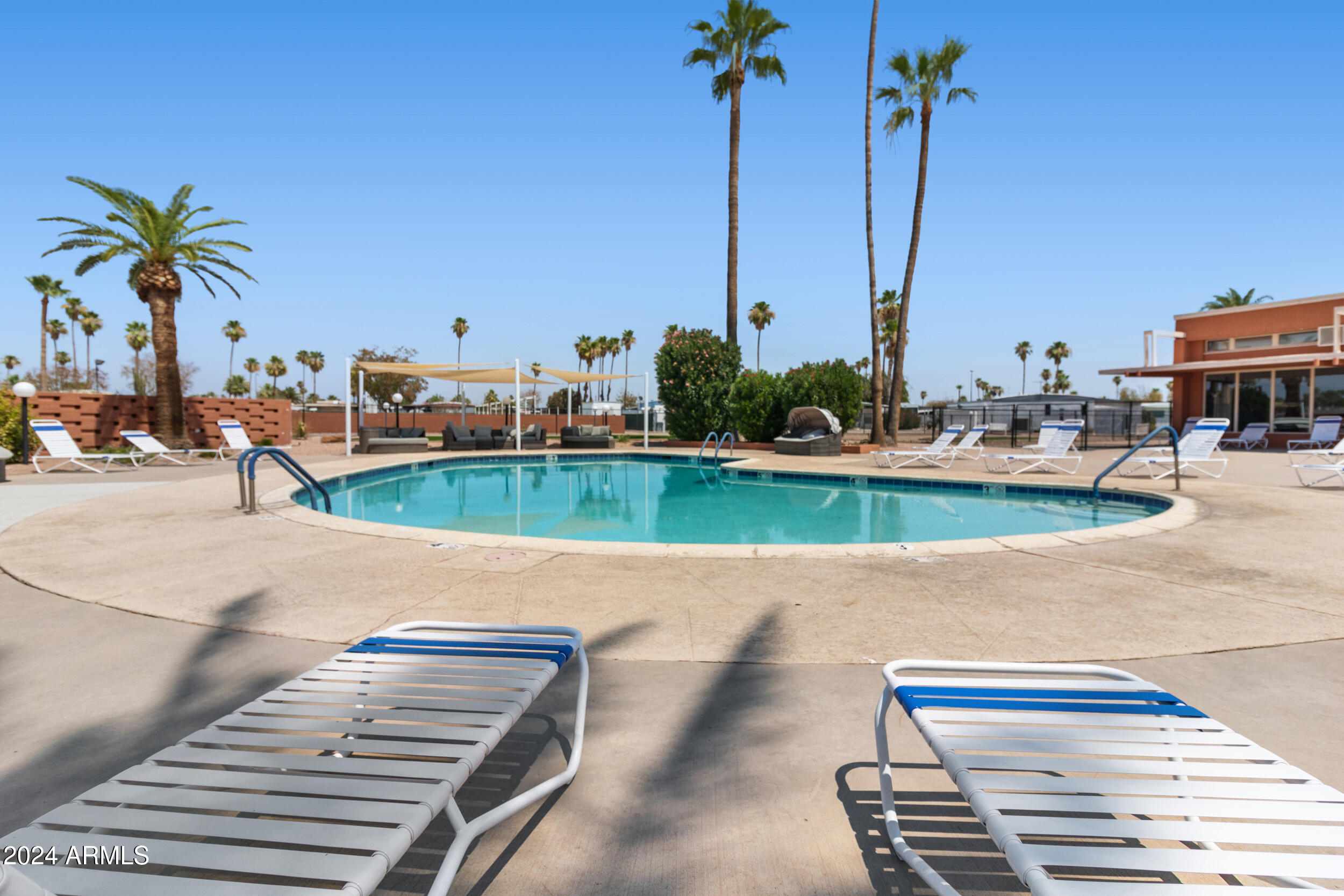 701 South Dobson Road, Unit 343 Mesa, AZ 85202 - Photo 39 of 70 a view of a terrace with lawn chairs