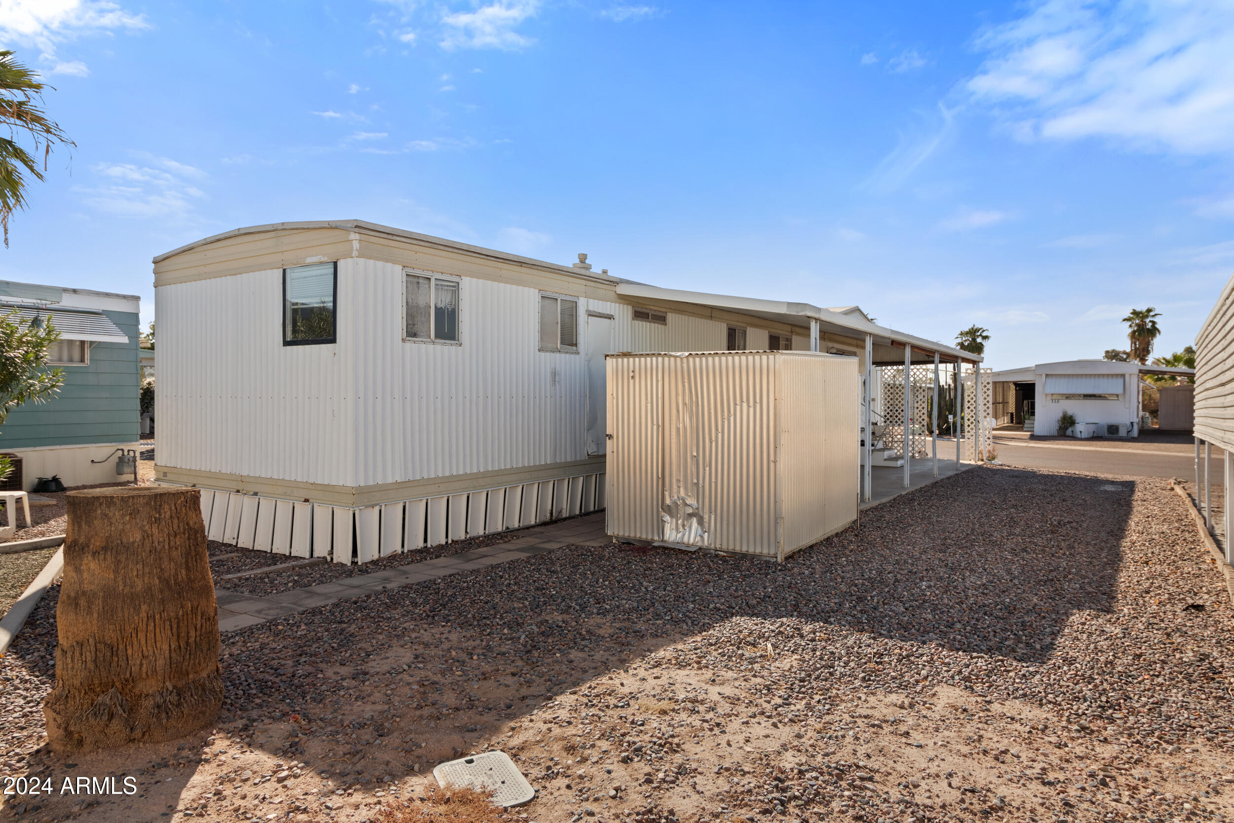 701 South Dobson Road, Unit 343 Mesa, AZ 85202 - Photo 61 of 70 a view of a house with backyard