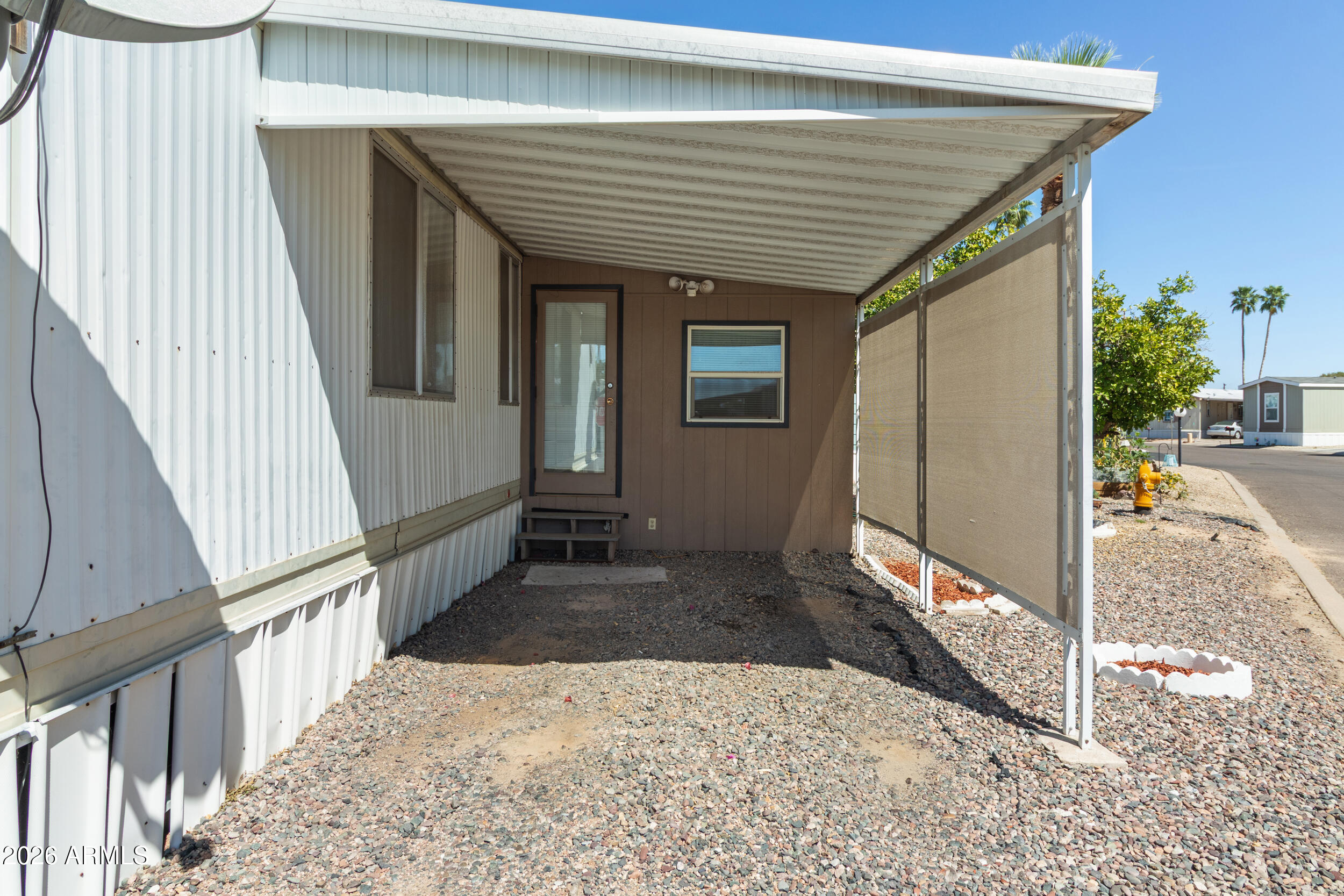 701 South Dobson Road, Unit 343 Mesa, AZ 85202 - Photo 63 of 70 a view of a house with wooden floor