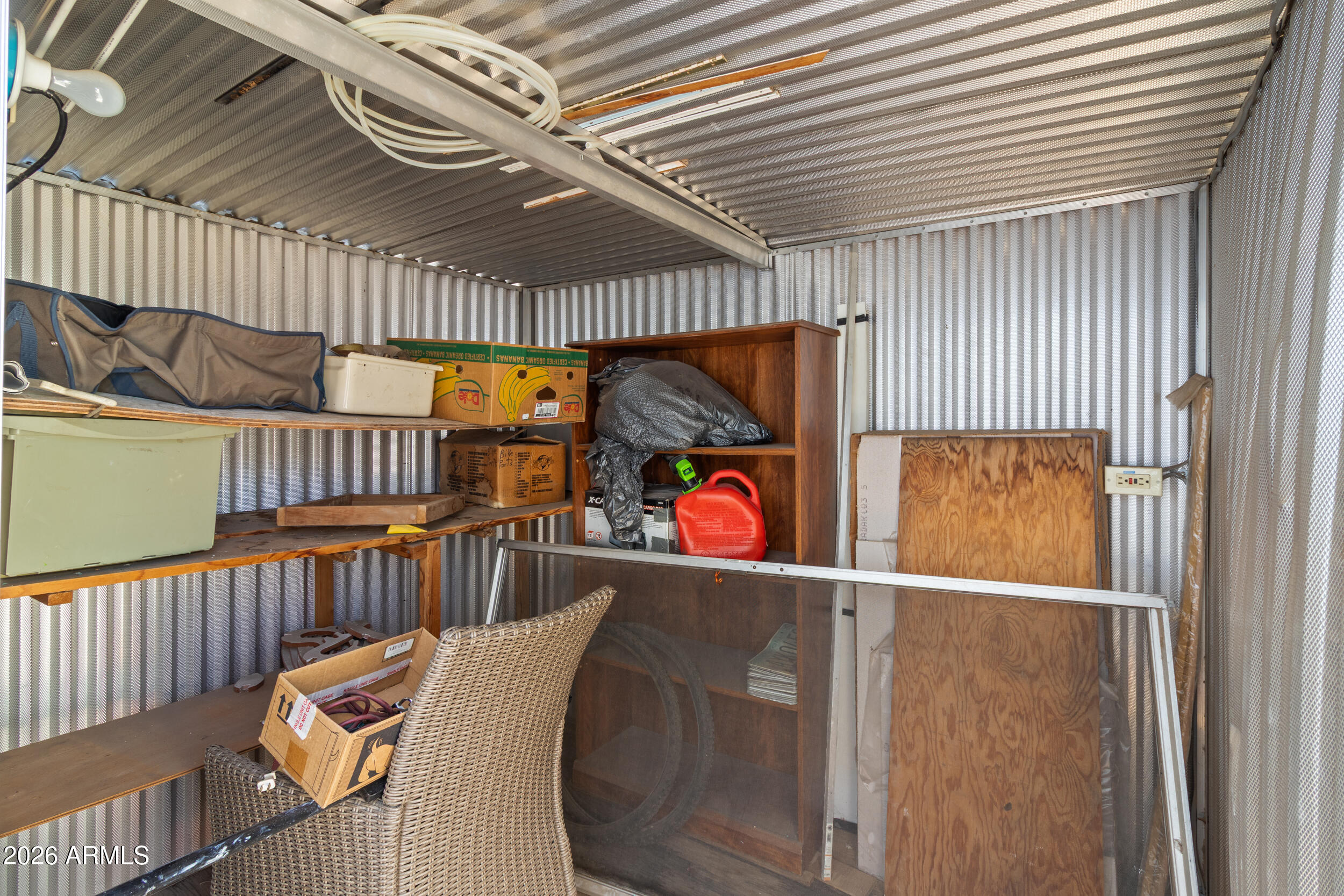 701 South Dobson Road, Unit 343 Mesa, AZ 85202 - Photo 67 of 70 an outdoor sitting area with wooden fence